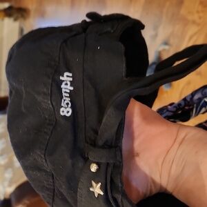 Women's 85mph Hat with several different color straps for the headband